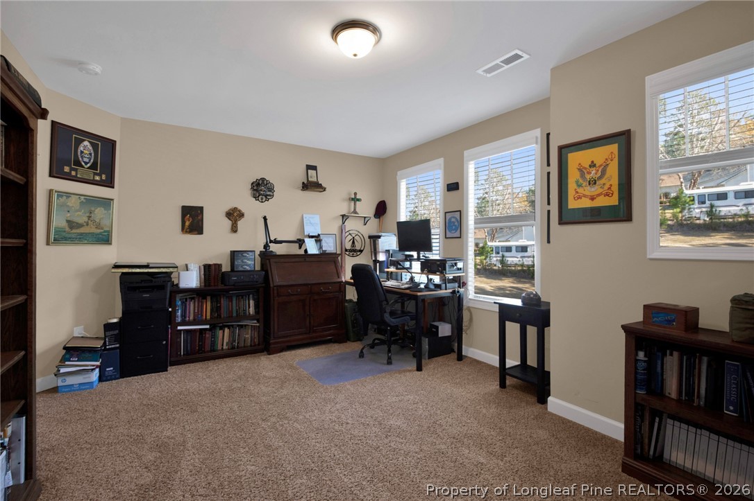 207 Pinetop Drive Carthage, NC 28327 - Photo 39 of 50 a living room with furniture workspace and a window