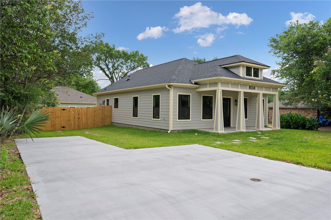 804 East 27th Street Bryan, TX 77803 - Photo 2 of 21 a view of a house with a backyard