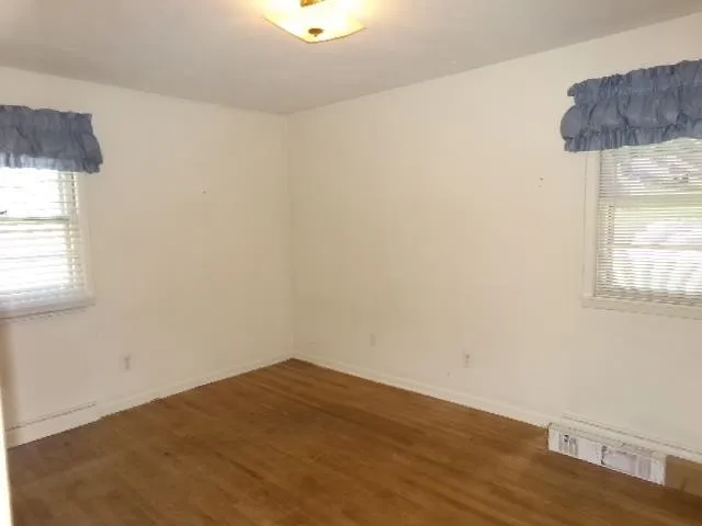 a view of a room that has a window in it