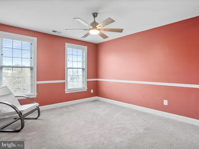 a view of storage and utility room with washer and dryer