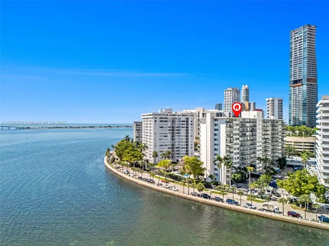 a view of a city with tall buildings