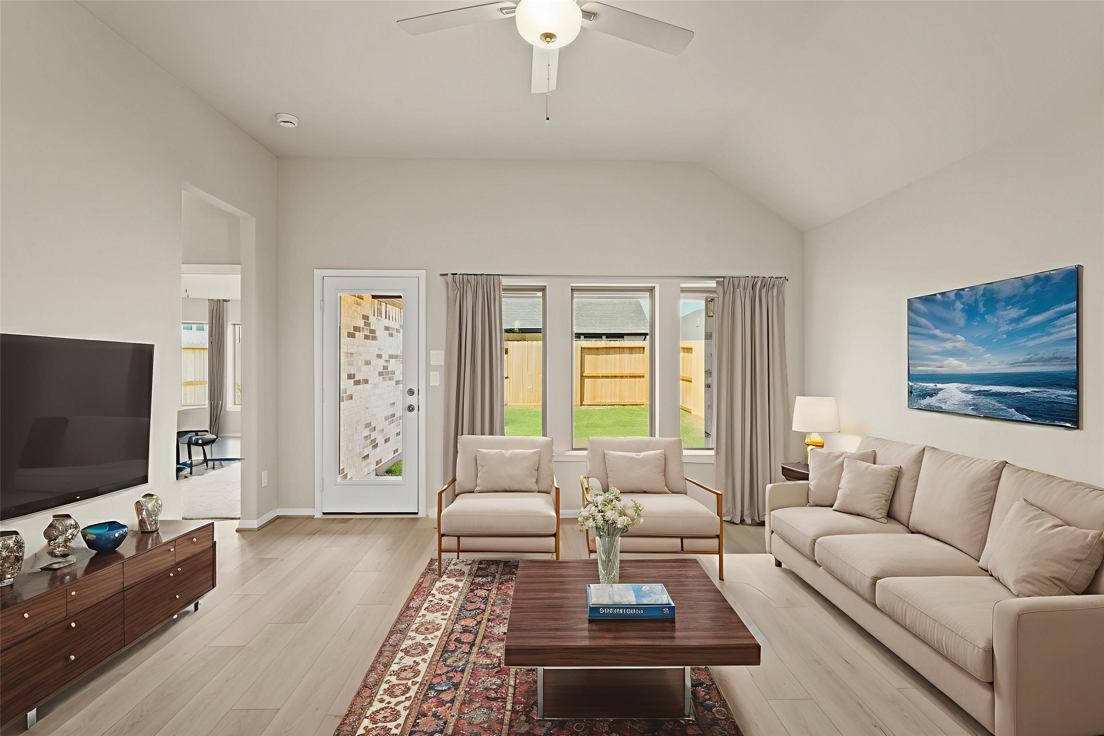 26530 Jolly Prairie Drive Hockley, TX 77447 - Photo 14 of 36 a living room with furniture and a flat screen tv