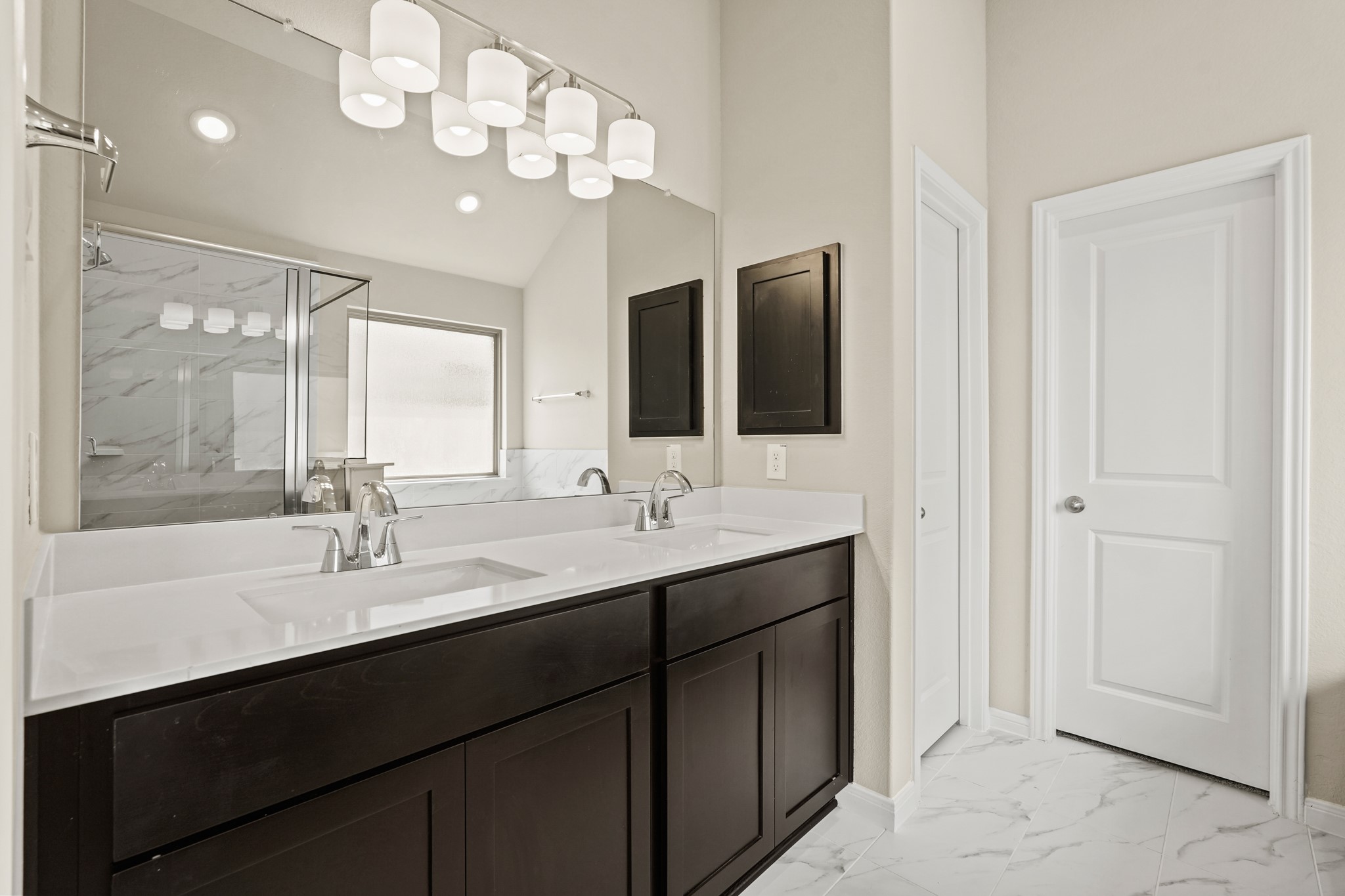 26530 Jolly Prairie Drive Hockley, TX 77447 - Photo 26 of 36 a bathroom with double sink and a mirror