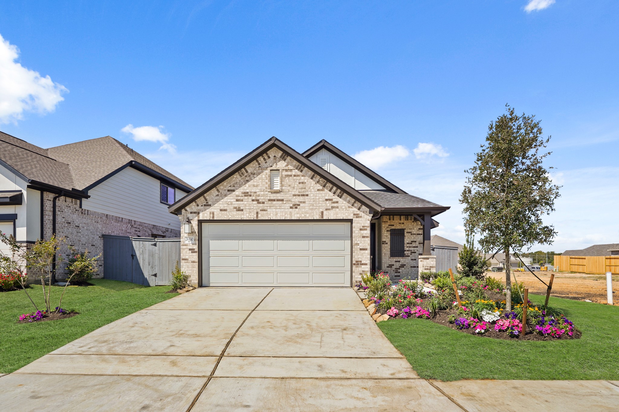 26530 Jolly Prairie Drive Hockley, TX 77447 - Photo 33 of 36 a front view of a house with a yard