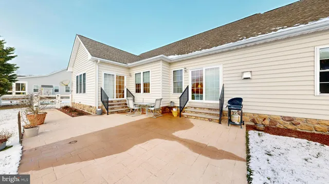a view of a water with a fountain in the back yard