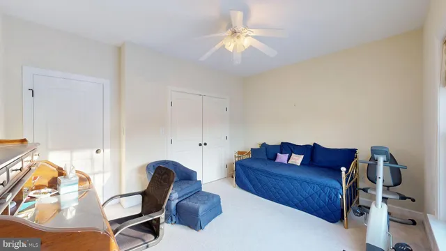 a view of a patio with table and chairs with wooden floor and fence