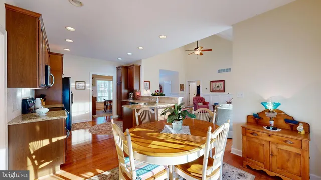 a kitchen with lots of counter top space and living room