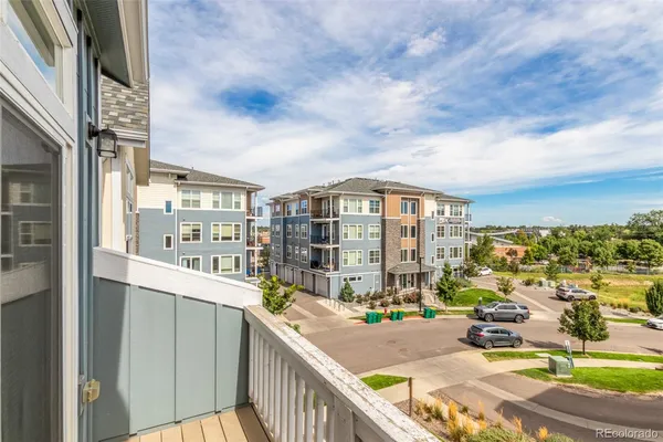 a view of a balcony with city view