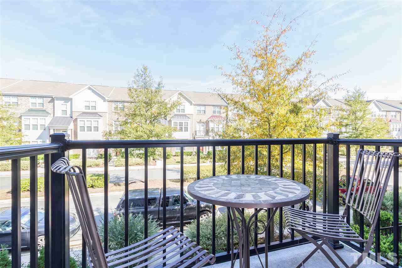 9135 Falkwood Road Raleigh, NC 27617 - Photo 8 of 25 The Juliet balcony is off the family room and is the second of three outdoor spaces. A perfect spot to enjoy your morning coffee.