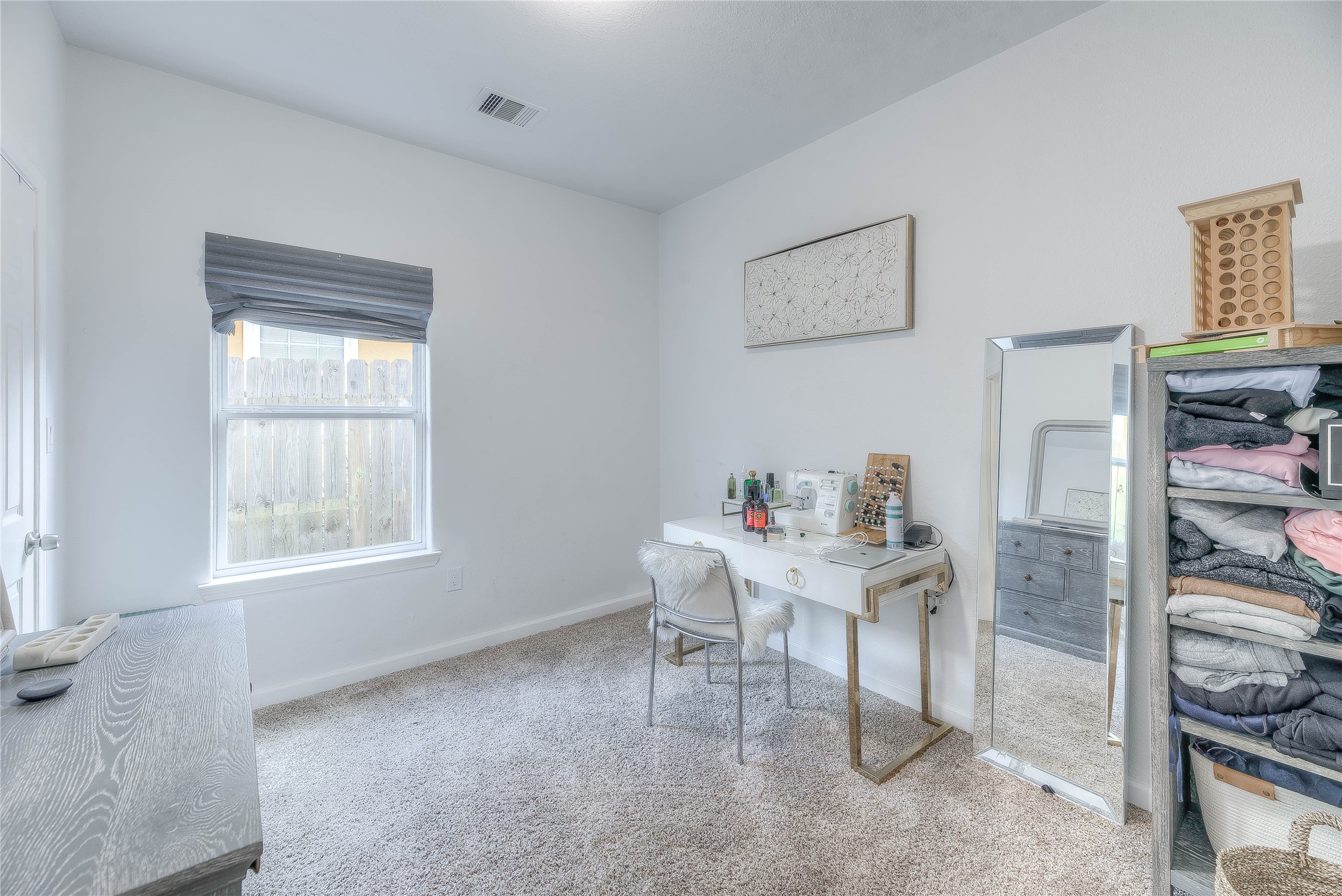 627 Pinewood Drive Trinity, TX 75862 - Photo 13 of 36 a workspace with furniture and window