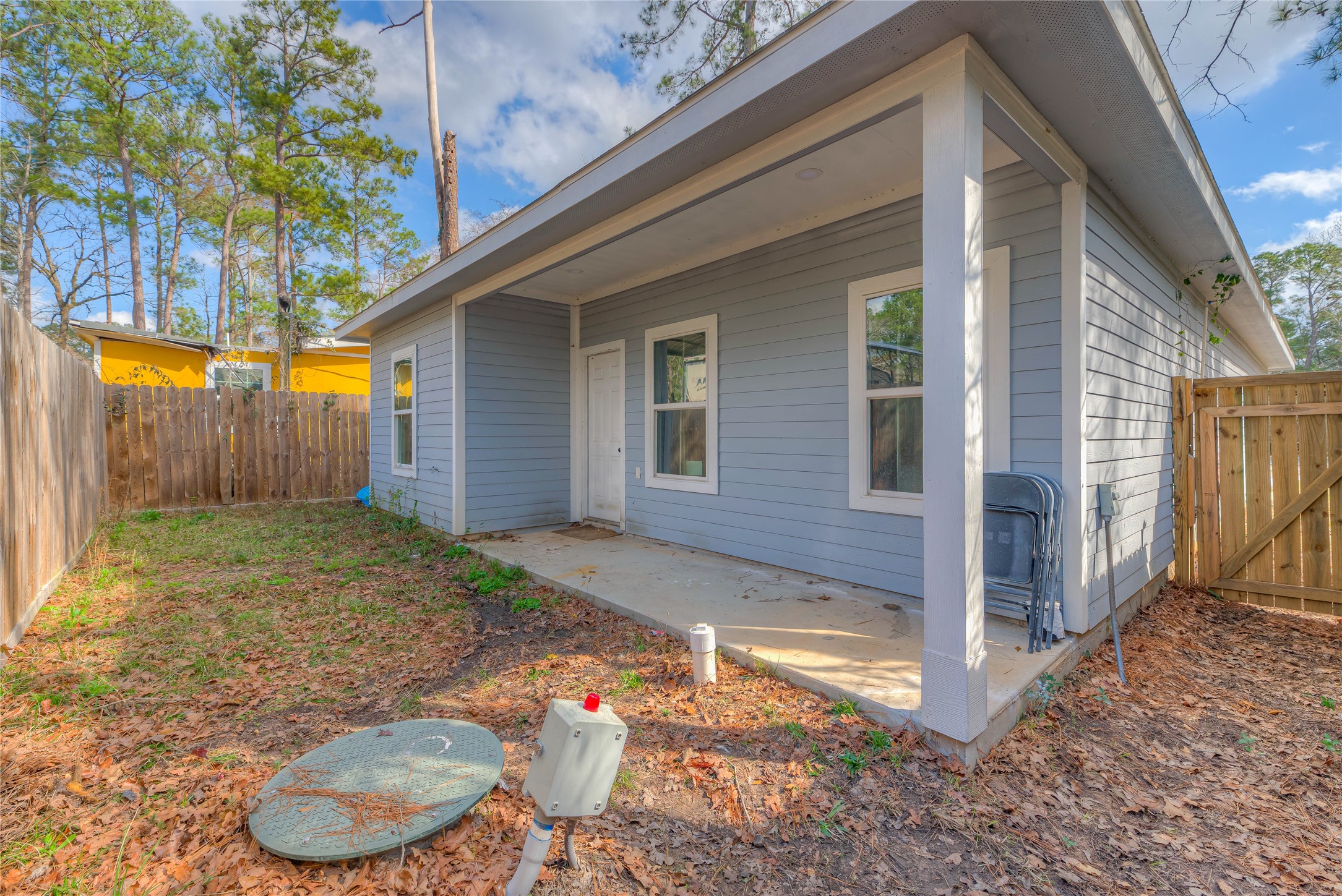627 Pinewood Drive Trinity, TX 75862 - Photo 25 of 36 a backyard of a house with seating space