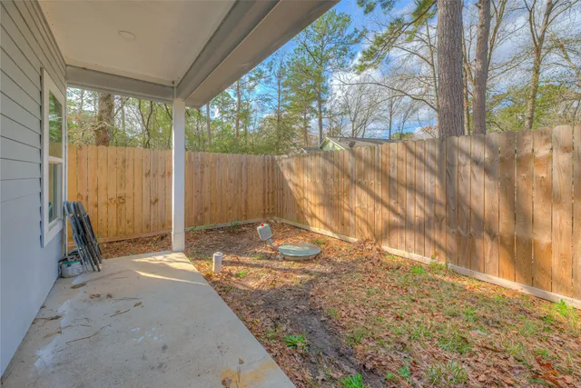 a view of a backyard of the house