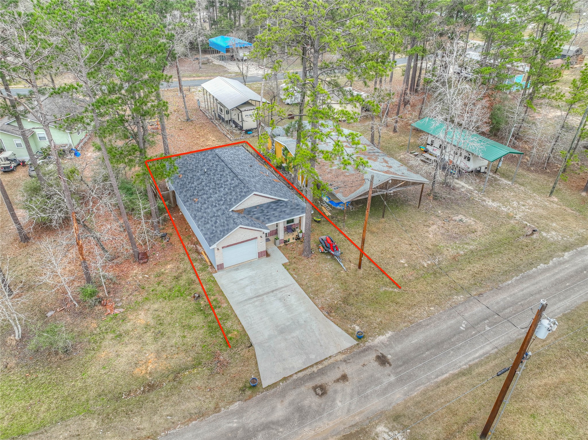 627 Pinewood Drive Trinity, TX 75862 - Photo 29 of 36 a view of a house with a backyard
