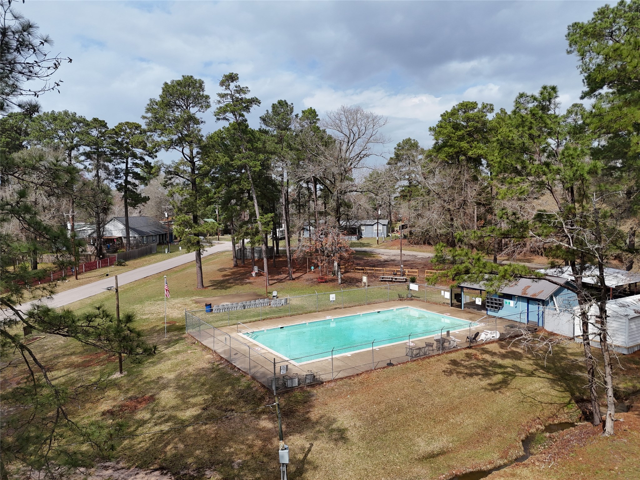 627 Pinewood Drive Trinity, TX 75862 - Photo 36 of 36 a view of a swimming pool with a patio