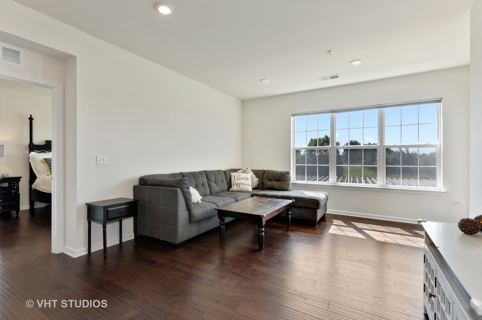 2701 Commons Drive, Unit 207 Glenview, IL 60026 - Photo 2 of 23 a living room with furniture and a large window