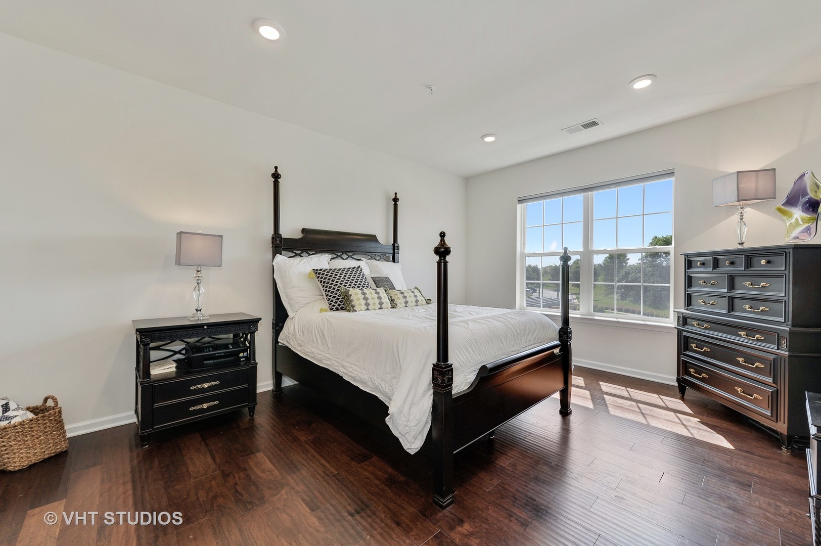 2701 Commons Drive, Unit 207 Glenview, IL 60026 - Photo 11 of 23 a bedroom with furniture and a wooden floor