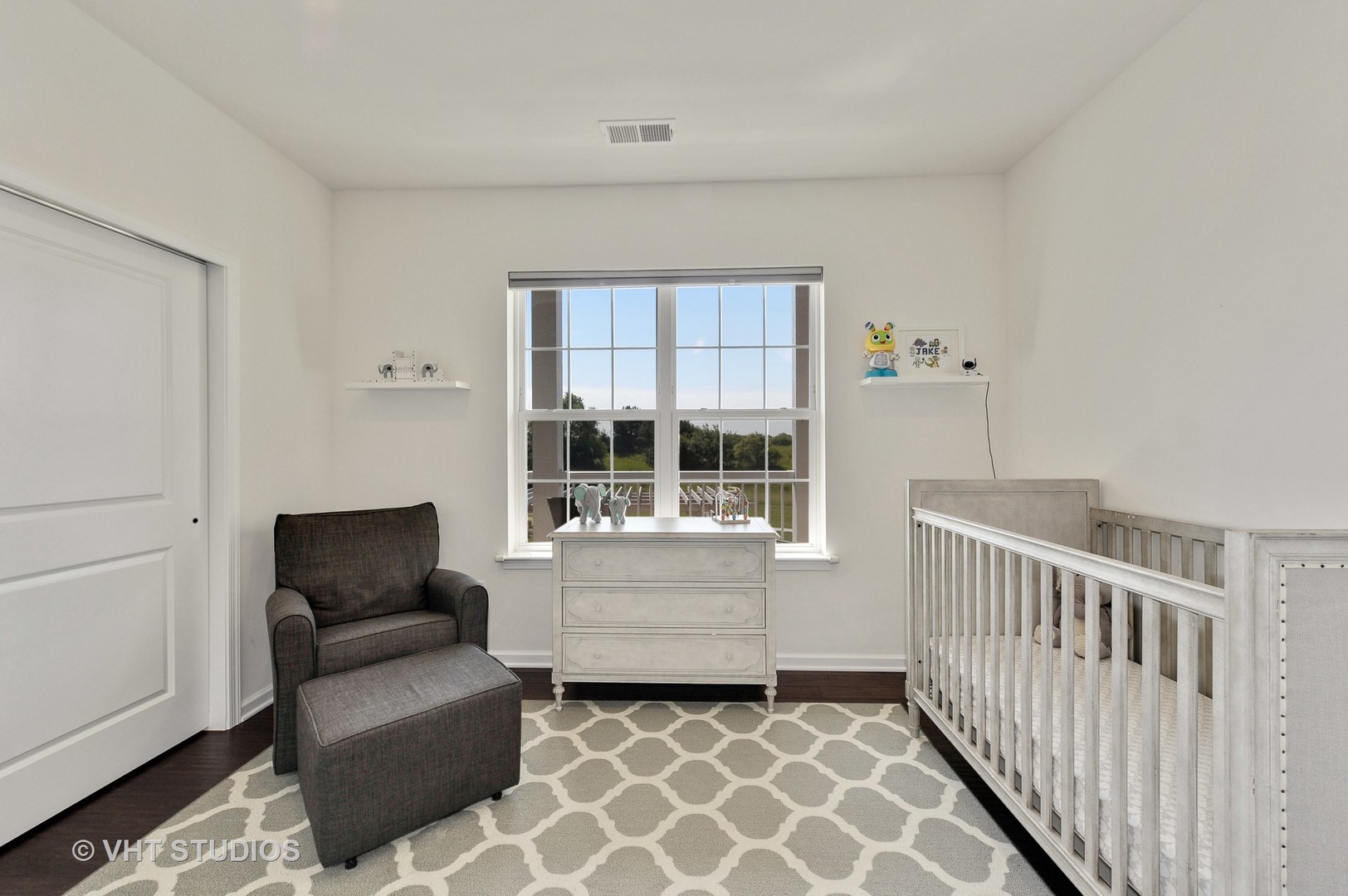 2701 Commons Drive, Unit 207 Glenview, IL 60026 - Photo 14 of 23 a living room with furniture and a window