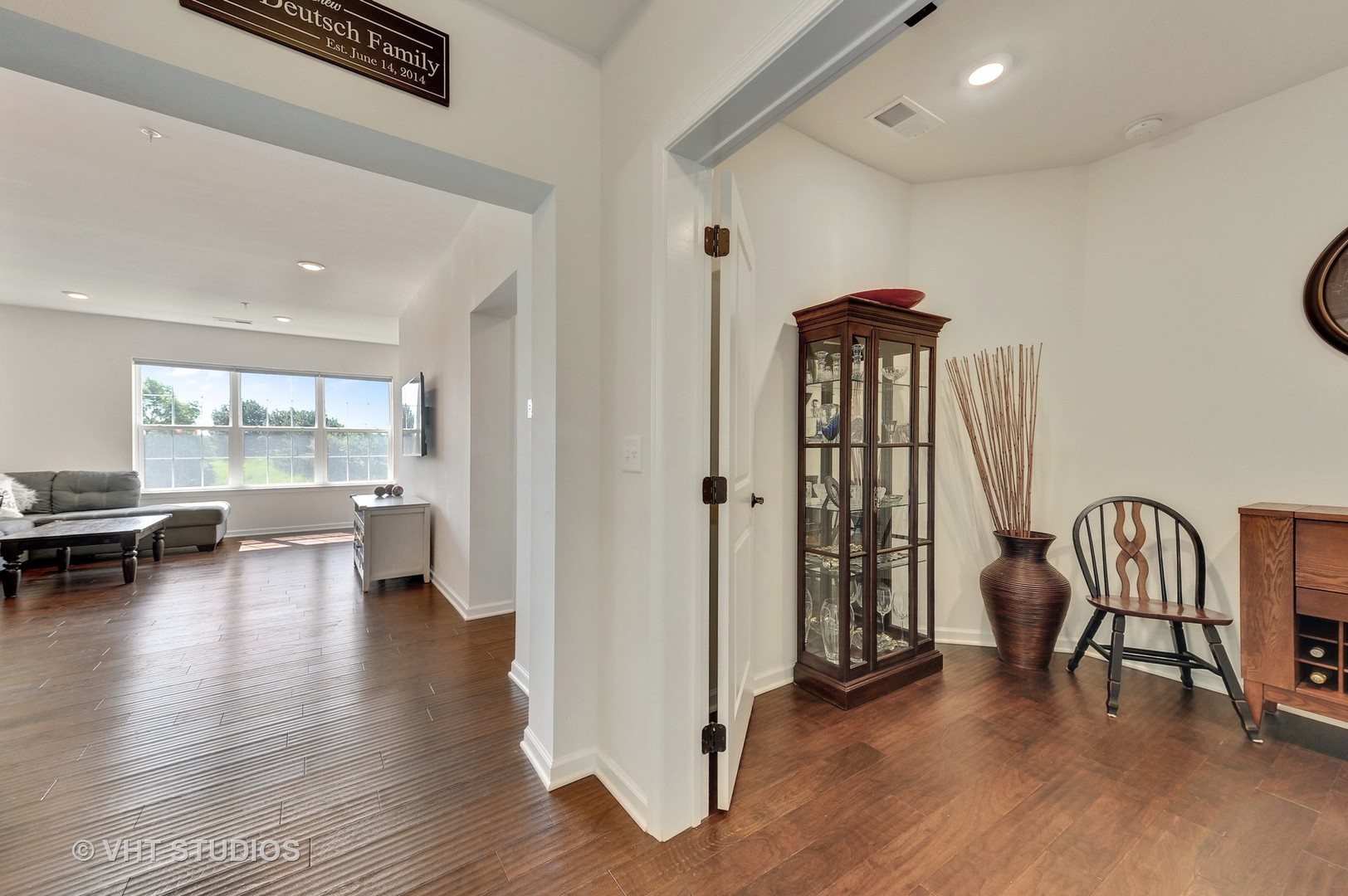 2701 Commons Drive, Unit 207 Glenview, IL 60026 - Photo 10 of 23 a view of a livingroom with furniture and a floor to ceiling window