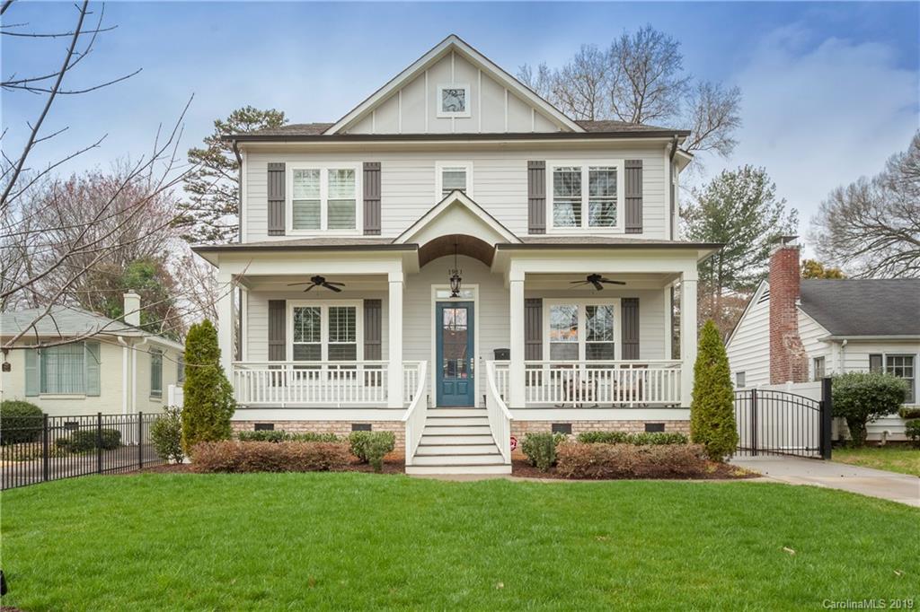 1911 Truman Road Charlotte, NC 28205 - Photo 1 of 30 a front view of a house with a yard