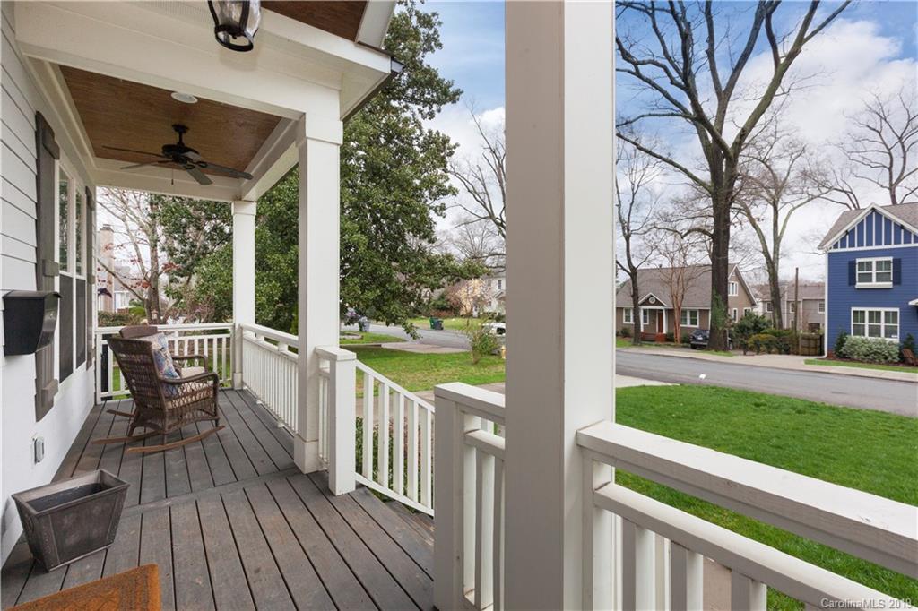 1911 Truman Road Charlotte, NC 28205 - Photo 2 of 30 a view of a deck with wooden floor and fence next to a yard