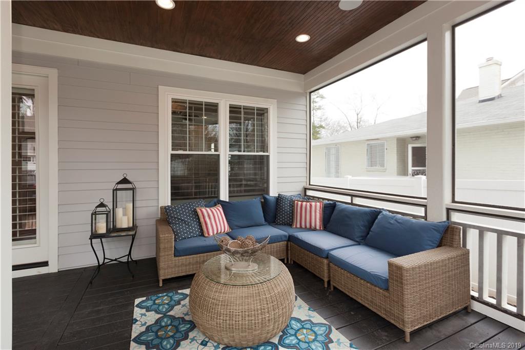 1911 Truman Road Charlotte, NC 28205 - Photo 27 of 30 a living room with furniture and a large window
