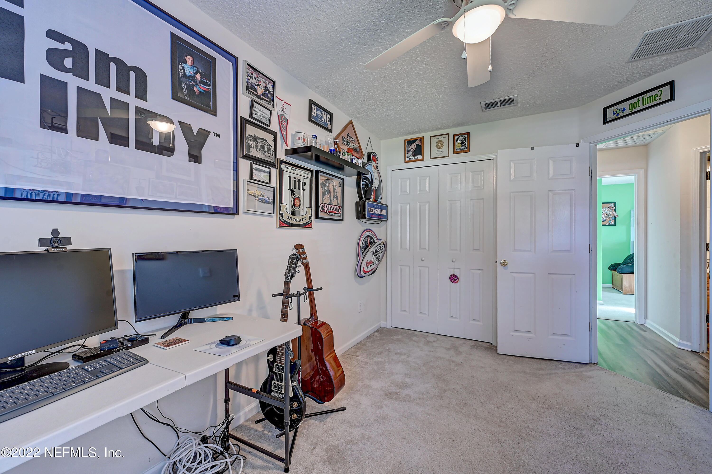 852 Crystal Spring Way St. Augustine, FL 32092 - Photo 23 of 28 a room with furniture and window