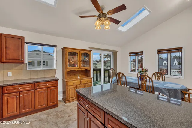 a view of a kitchen and dining room
