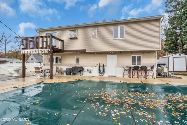 a backyard of a house with seating space