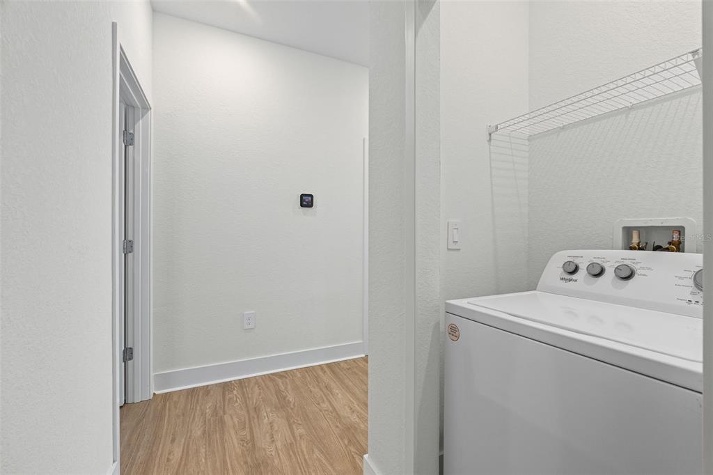 14456 Stellar Place Lakewood Ranch, FL 34202 - Photo 14 of 34 a utility room with dryer and washer