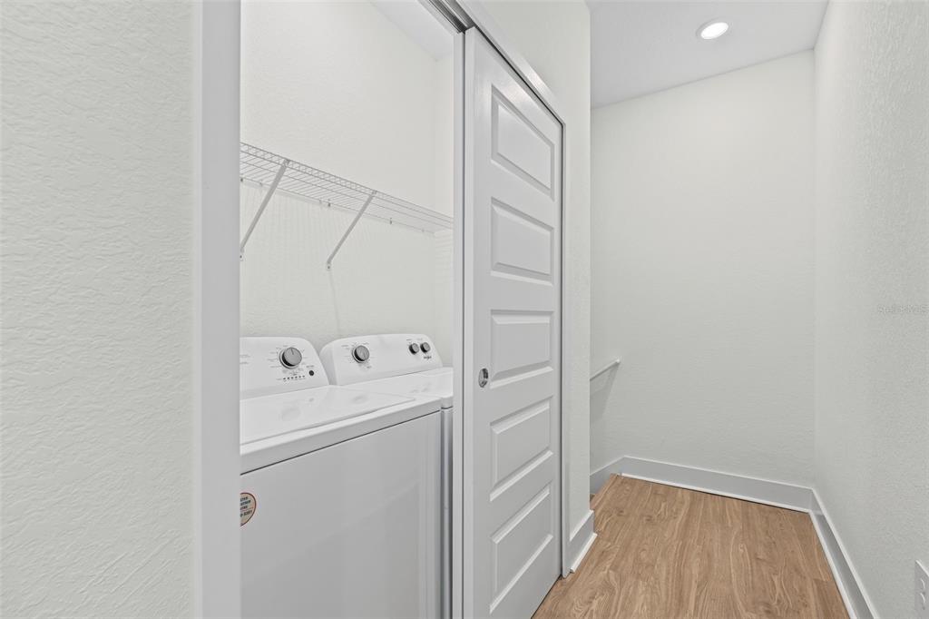 14456 Stellar Place Lakewood Ranch, FL 34202 - Photo 15 of 34 a room with a washer and dryer