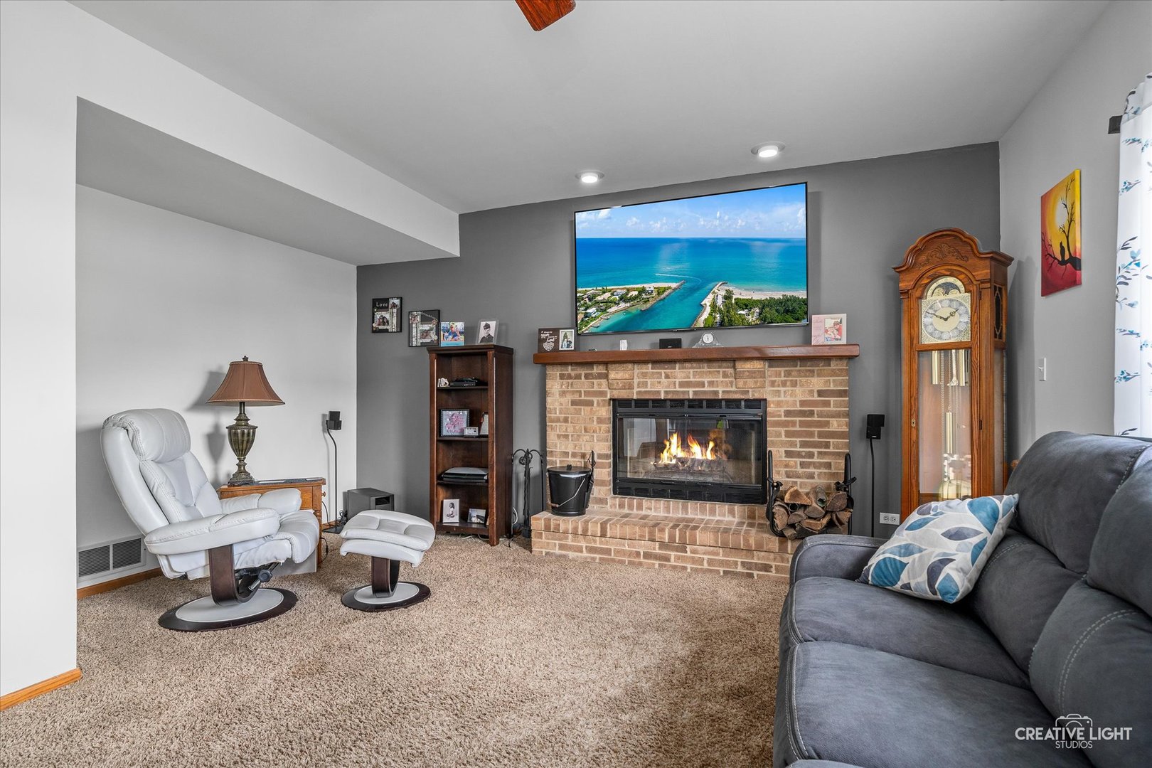3405 Fiday Road Joliet, IL 60431 - Photo 11 of 26 a living room with furniture and a fireplace