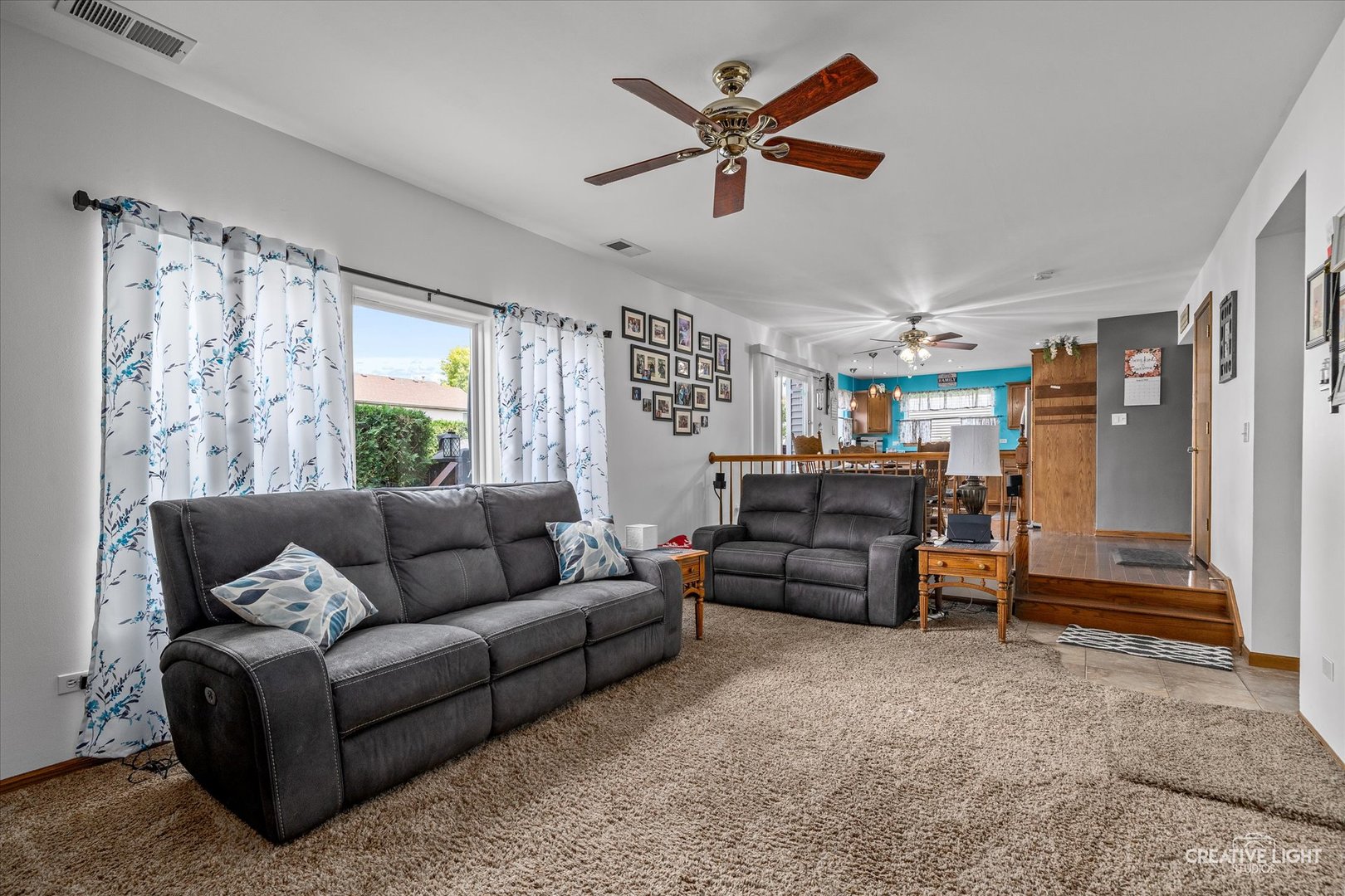 3405 Fiday Road Joliet, IL 60431 - Photo 12 of 26 a living room with furniture and a large window