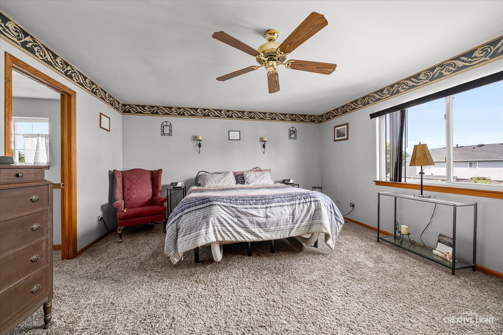 3405 Fiday Road Joliet, IL 60431 - Photo 18 of 26 a bedroom with a bed next to a window