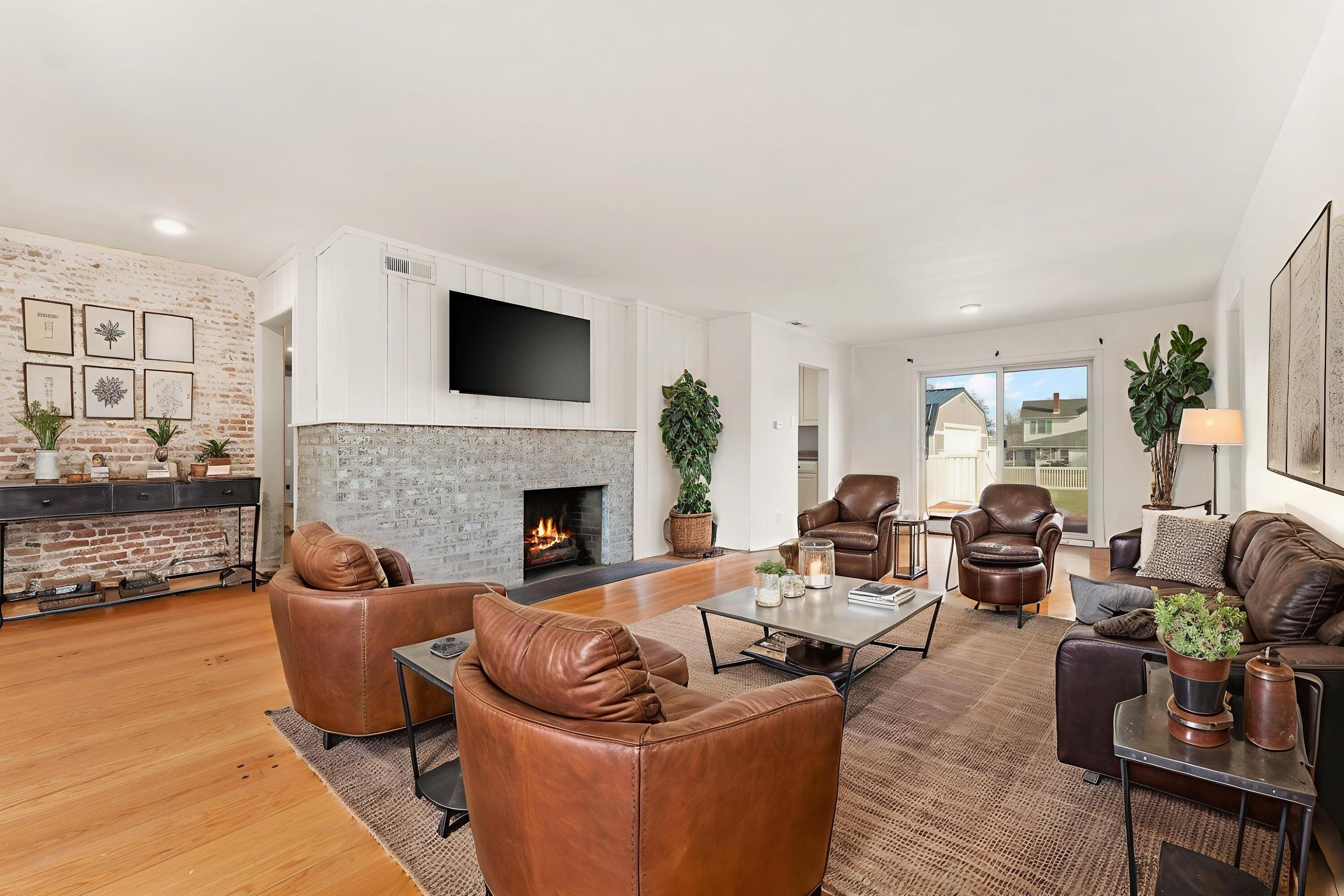 323 South Home Avenue Rensselaer, IN 47978 - Photo 3 of 20 a living room with furniture fireplace and a flat screen tv