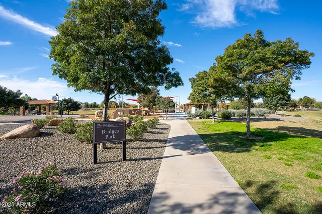 a view of a garden with houses
