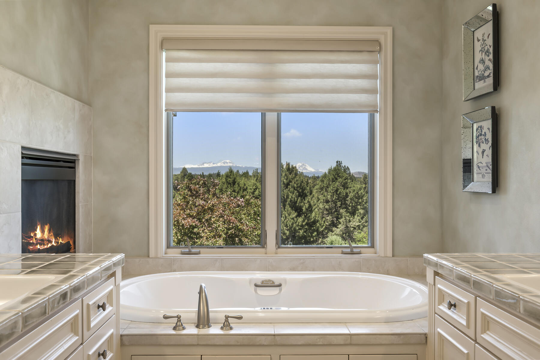 61445 Gosney Road Bend, OR 97702 - Photo 60 of 83 a bathroom with a bathtub and a shower