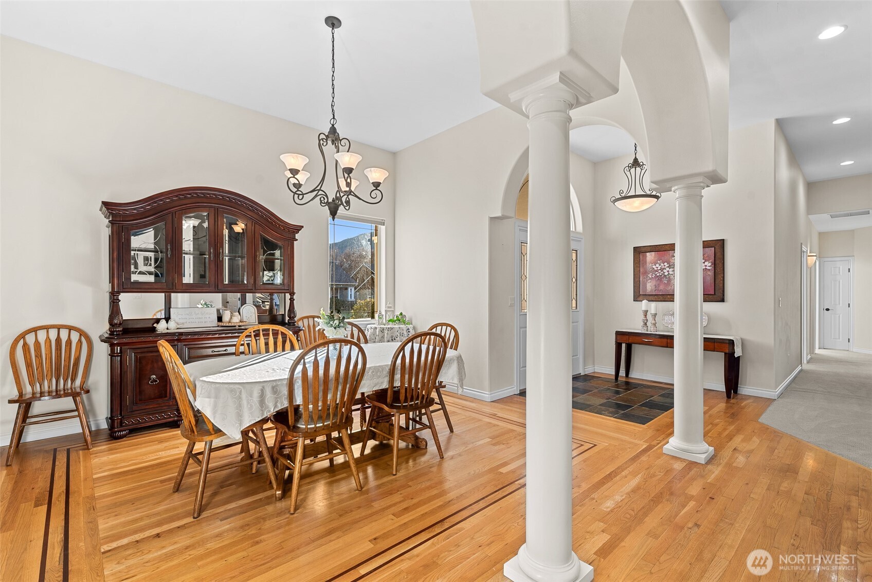 105 Cascade Place Cashmere, WA 98815 - Photo 19 of 39 a view of a dining room with furniture and wooden floor