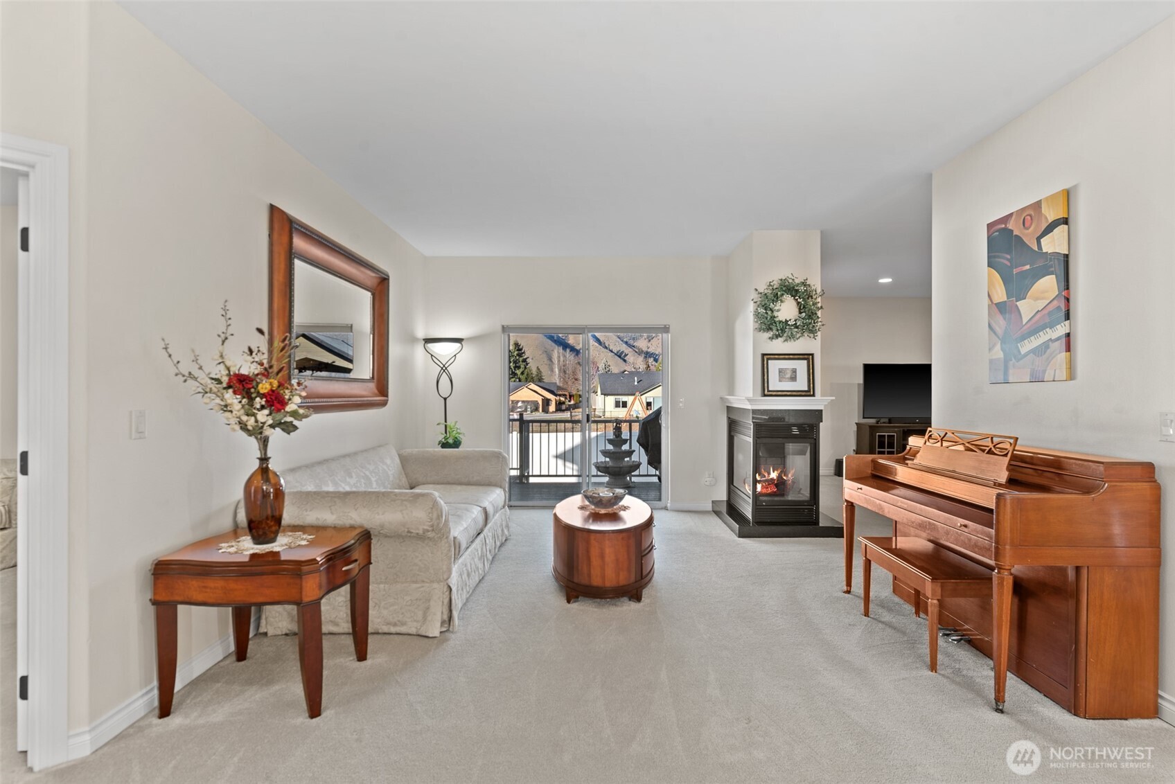 105 Cascade Place Cashmere, WA 98815 - Photo 6 of 39 a living room with furniture a window and piano