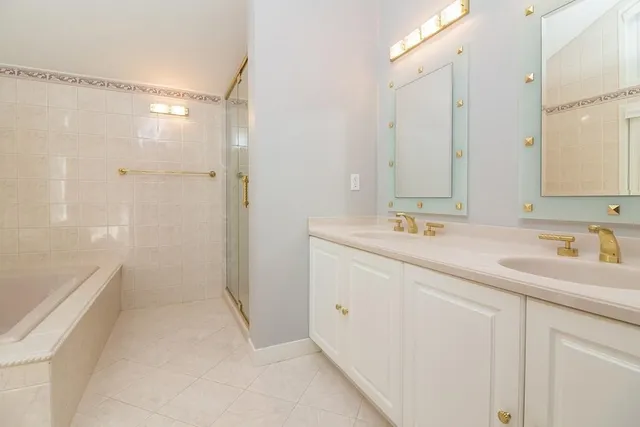 a view of a livingroom with wooden floor and window