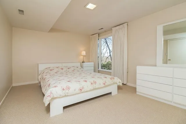 a room with a sink cabinets and utility room