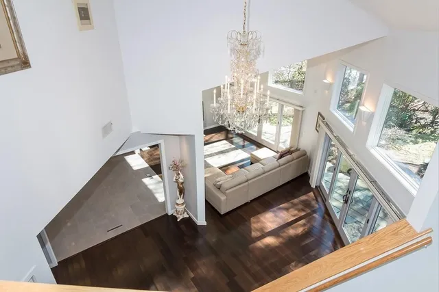 a view of a house with snow on the road