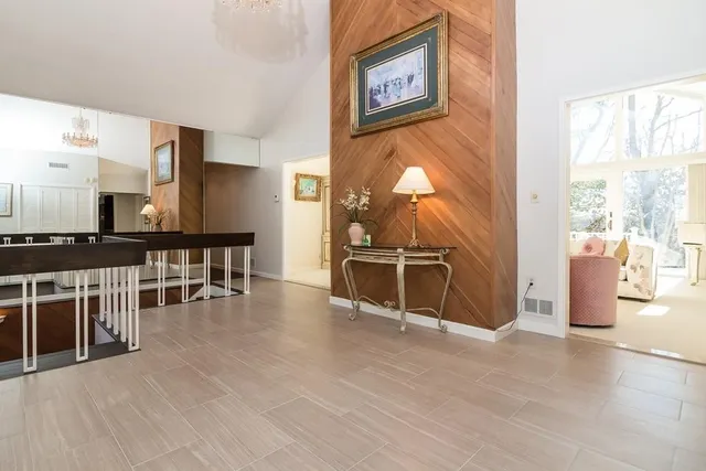 a view of a kitchen with furniture and a window