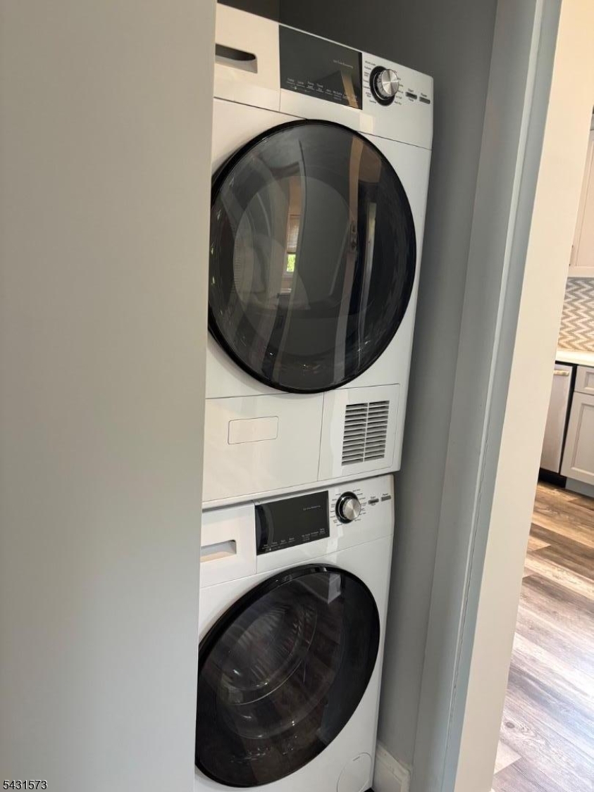 358 Woodland Road, Unit 2 Madison, NJ 07940 - Photo 32 of 50 a utility room with dryer and washer