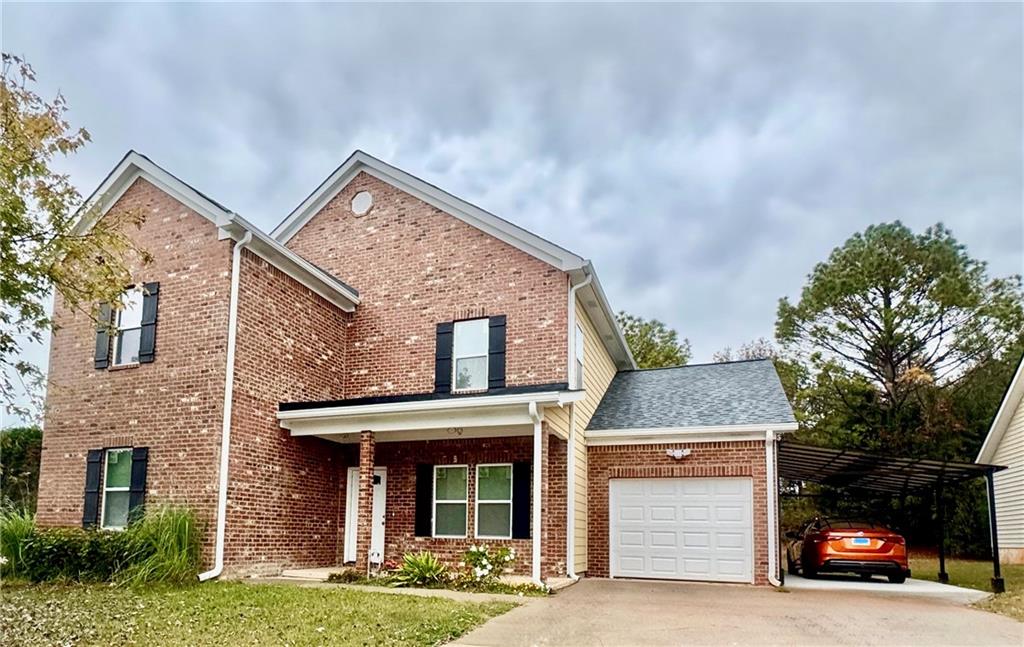 a front view of a house with yard