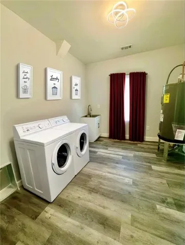 a utility room with dryer and washer