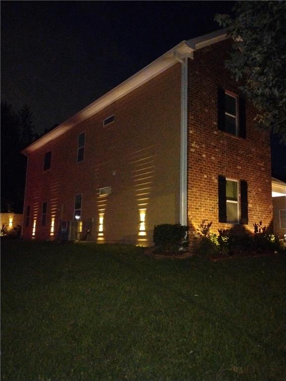 3700 Hudson Court Rex, GA 30273 - Photo 28 of 28 a front view of a house with a yard
