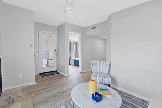 a view of livingroom with furniture and wooden floor