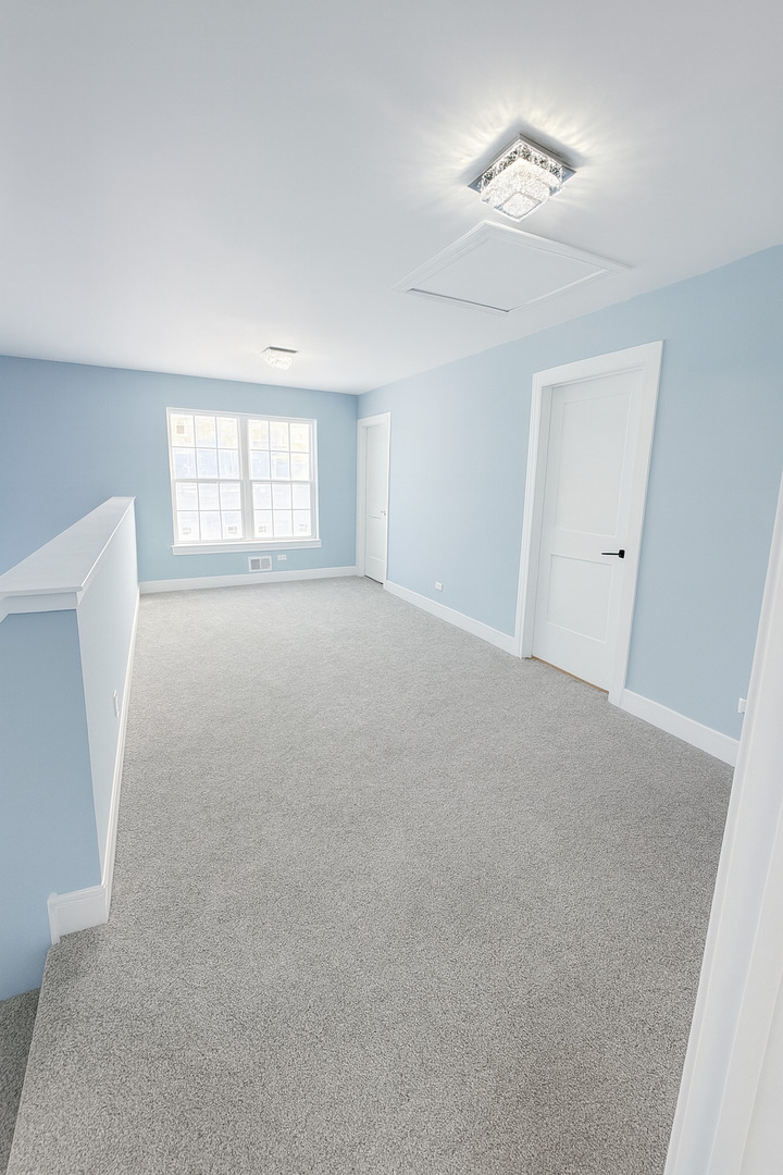 740 East 155th Street Phoenix, IL 60426 - Photo 12 of 18 a view of an empty room with a window