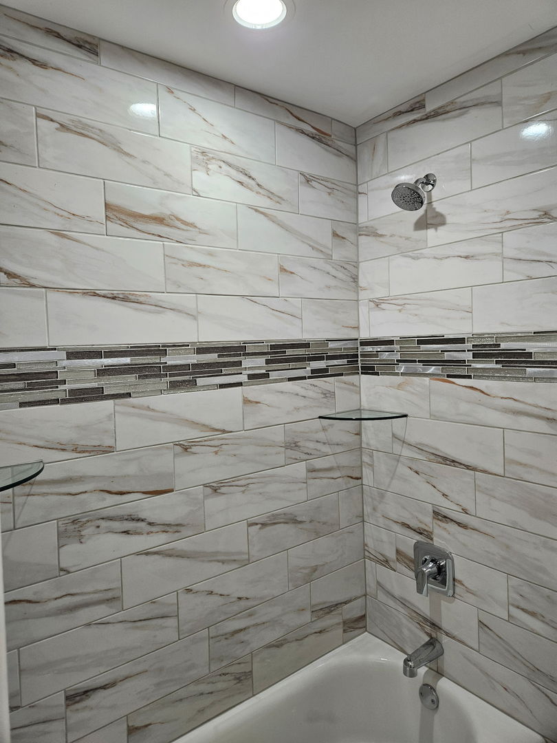 740 East 155th Street Phoenix, IL 60426 - Photo 17 of 18 a close view of a shower in bathroom