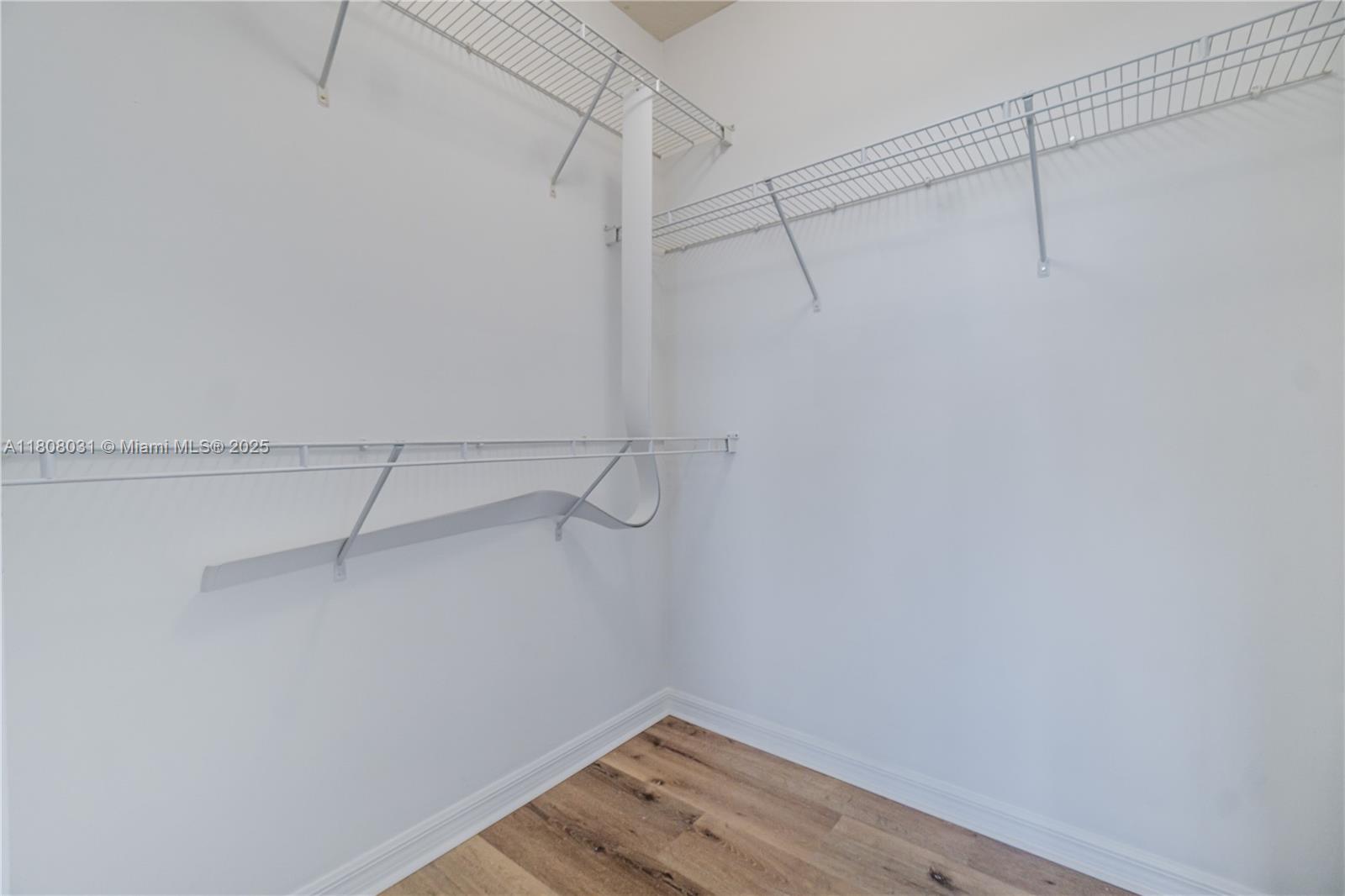 2665 Southwest 37th Avenue, Unit 906 Miami, FL 33133 - Photo 19 of 35 a view of a room with racks on the wall